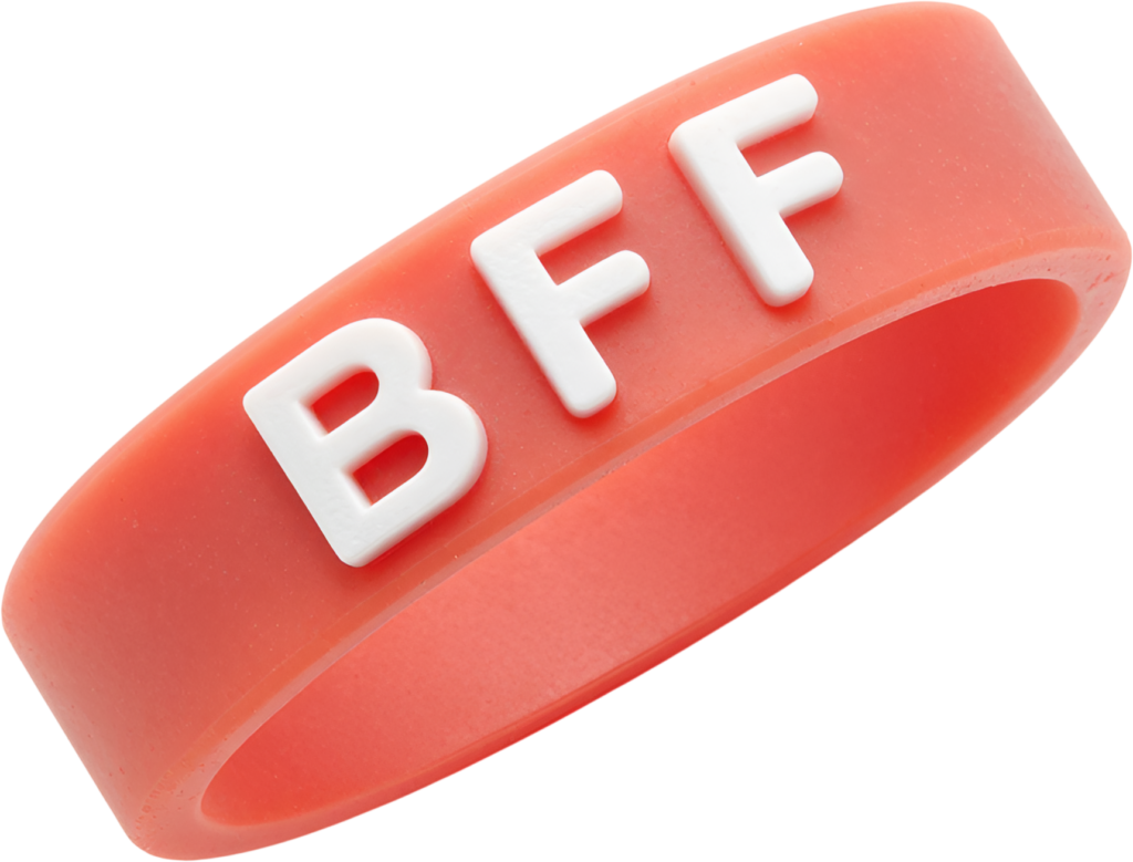 A delicate peach colored ‘BFF’ silicone wristband with raised white letters, perfect for a subtle PNG Clipart design